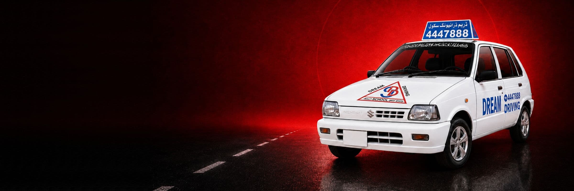 Suzuki Mehran manual training car on the road